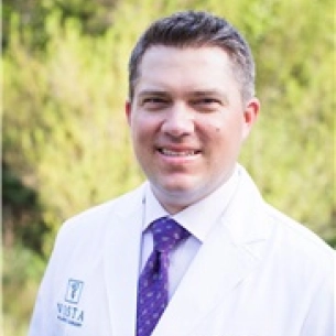 Justin Booth board-certified labiaplasty surgeon