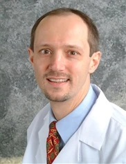 Vidas Dumasius board-certified labiaplasty surgeon