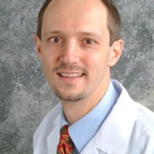 Vidas Dumasius board-certified labiaplasty surgeon