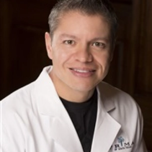 Oscar Ochoa board-certified labiaplasty surgeon