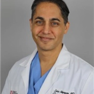 John Menezes board-certified labiaplasty surgeon