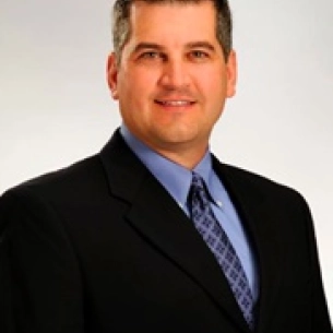 James Saar board-certified labiaplasty surgeon