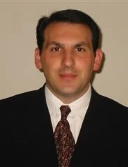 John Roussalis board-certified labiaplasty surgeon
