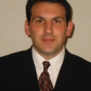 John Roussalis board-certified labiaplasty surgeon