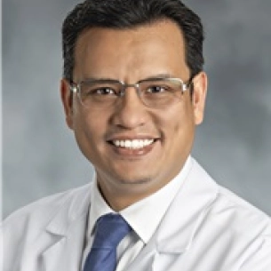 Kongkrit Chaiyasate board-certified labiaplasty surgeon