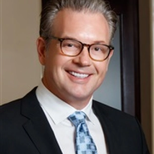 Kenneth Smart board-certified labiaplasty surgeon