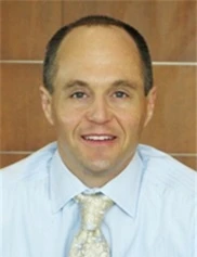 Kenneth Dembny board-certified labiaplasty surgeon