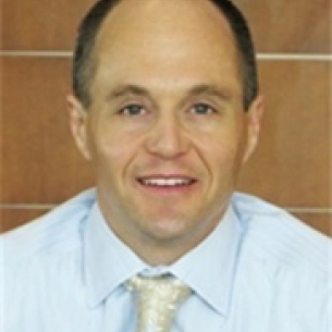 Kenneth Dembny board-certified labiaplasty surgeon