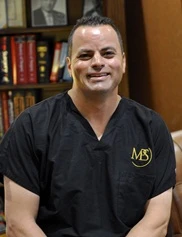 Tamir Mosharrafa board-certified labiaplasty surgeon