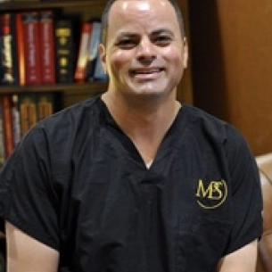 Tamir Mosharrafa board-certified labiaplasty surgeon