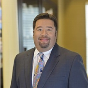 Forrest Wall board-certified labiaplasty surgeon