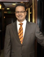 Milind Ambe board-certified labiaplasty surgeon