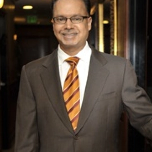 Milind Ambe board-certified labiaplasty surgeon