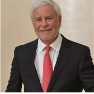 George Toledo board-certified labiaplasty surgeon
