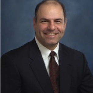 Hakan Kutlu board-certified labiaplasty surgeon