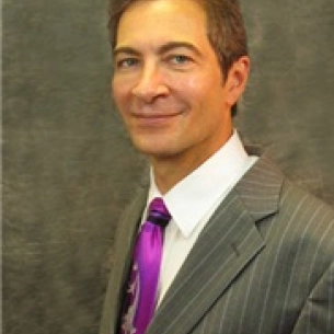 A. George Volpe board-certified labiaplasty surgeon