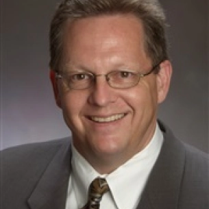 William Dougherty board-certified labiaplasty surgeon