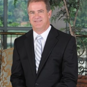 Mark McClung board-certified labiaplasty surgeon
