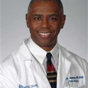 Milton Armstrong board-certified labiaplasty surgeon
