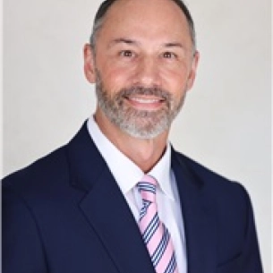 William Reno board-certified labiaplasty surgeon