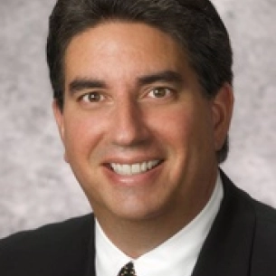Adam Angeles board-certified labiaplasty surgeon